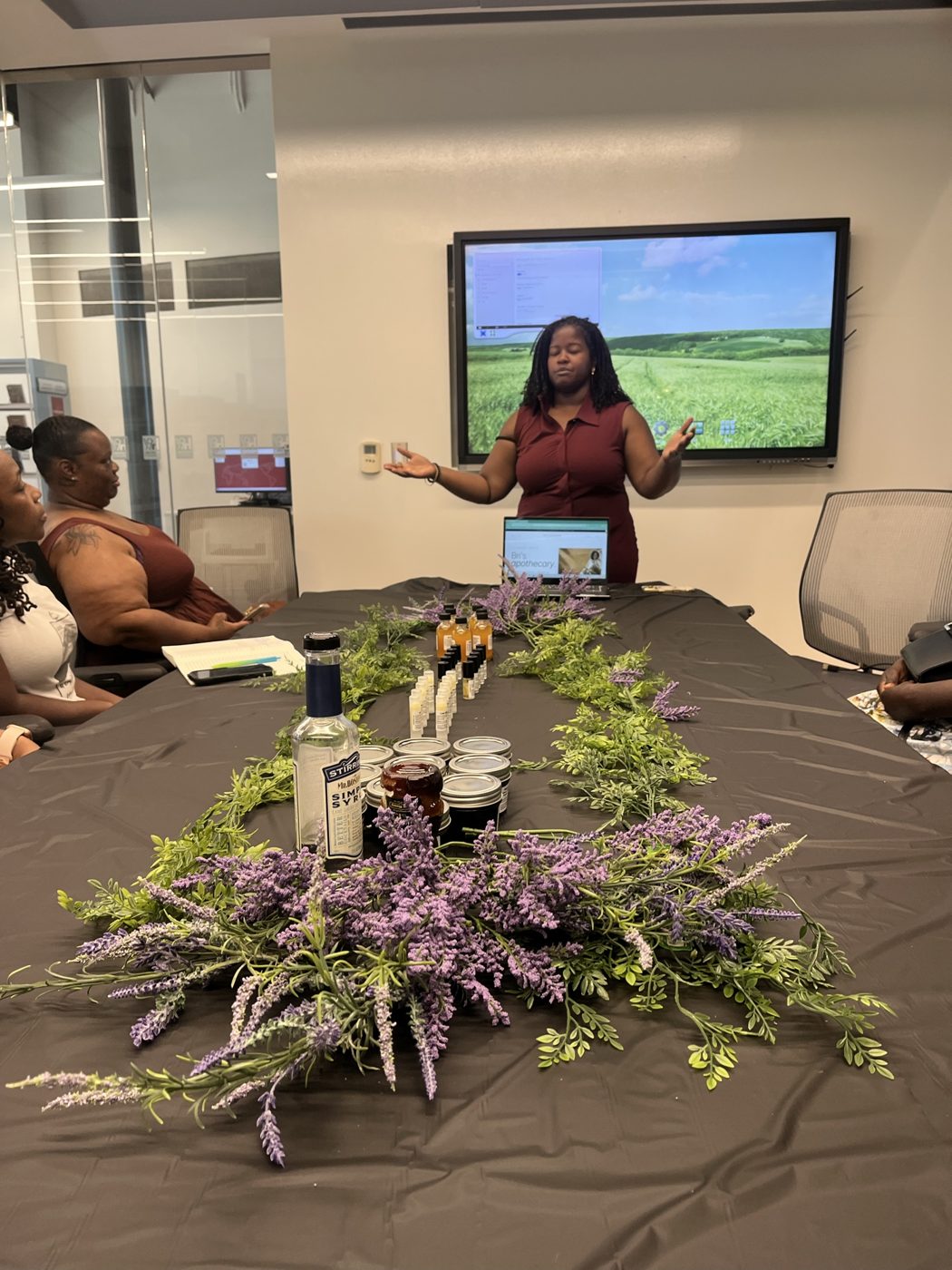 Caryn B. Malone presenting her Home Apothecary site during Level 3 final defense