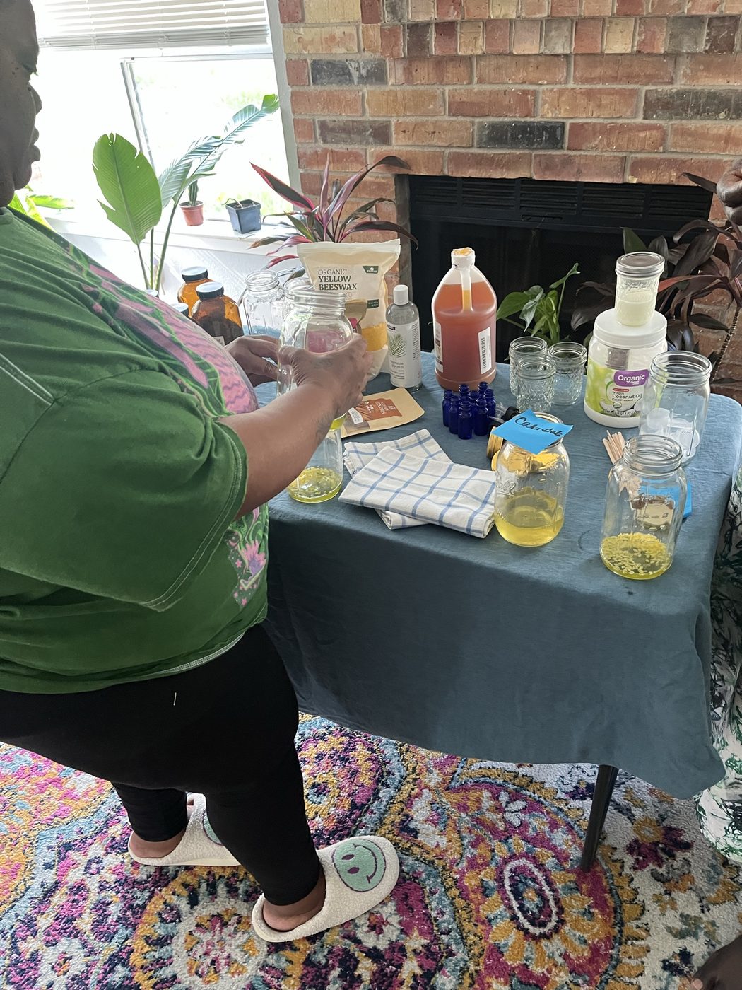 Student preparing solar infusion jars