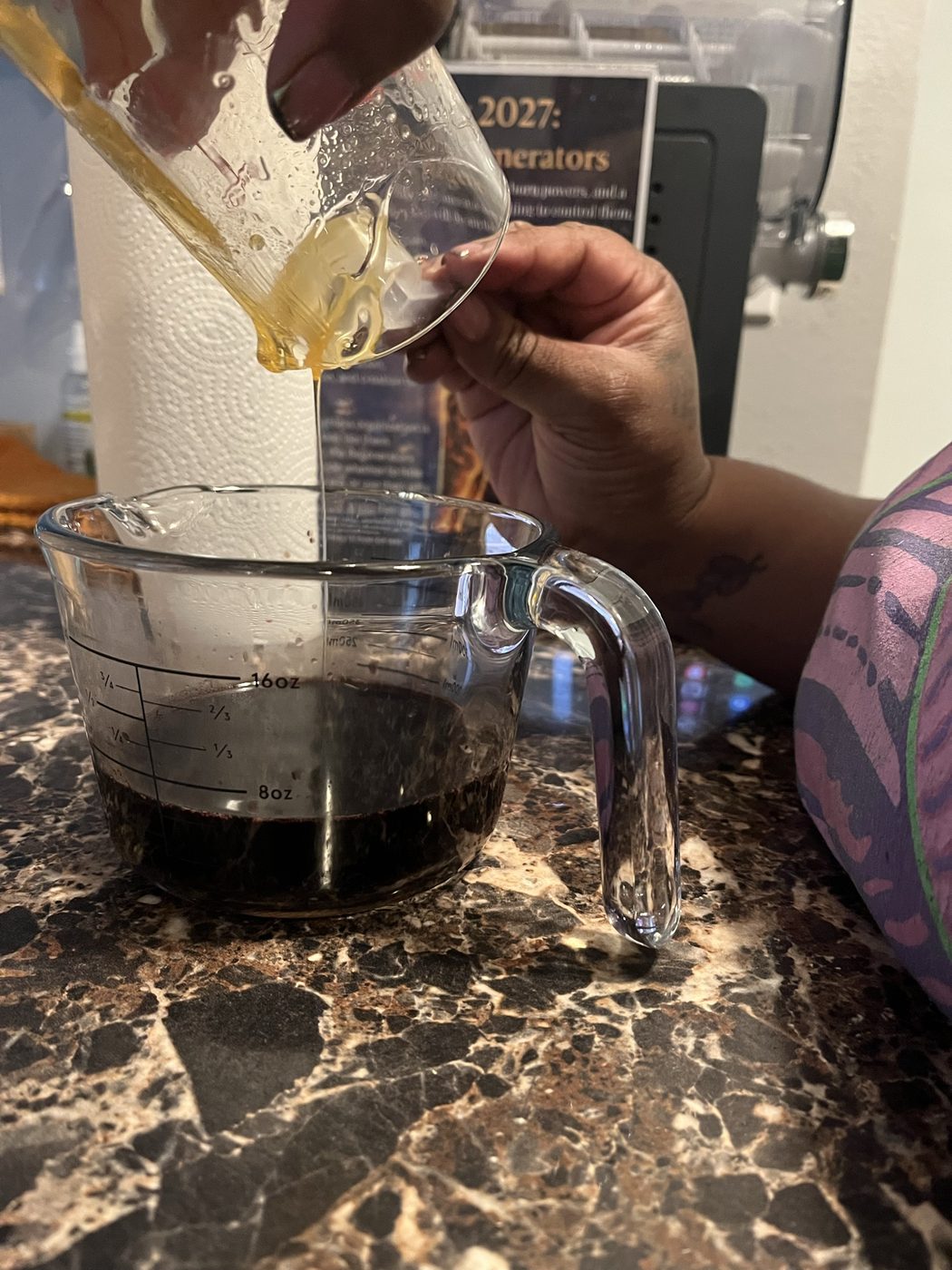 Pouring honey into the syrup decoction