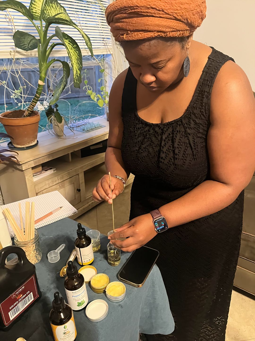 Cohort 1 student crafting medicine by hand